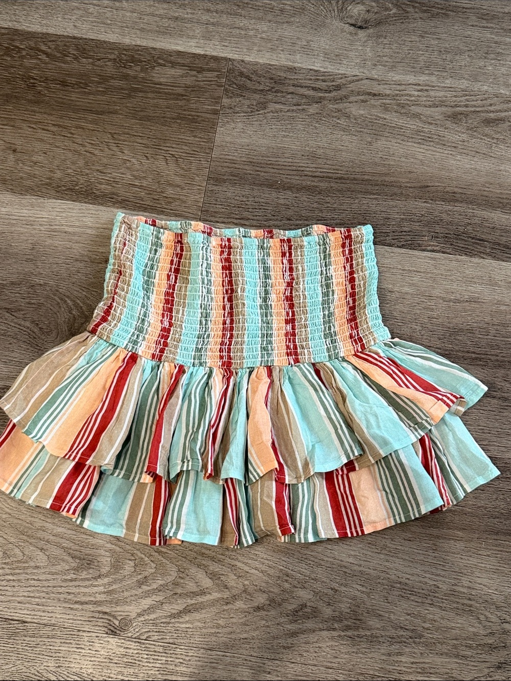 PilyQ Smocked Skirt in multicolor
Striped Ruffle Smocked Mini Skirt